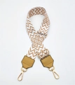 Close-up of herringbone woven canvas bag strap with PU leather ends and gold metal hooks - Khaki Wave with Khaki Leather