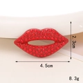 Macro shot of red rhinestone lip accessory with size 4.5cm x 2.3cm and 8.3g weight - D305 Red Lips