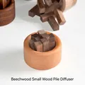 Diffuseur d'huiles essentielles en hêtre avec bâtonnets en bois sur socle minimaliste - Petit Tas de Bois Hêtre