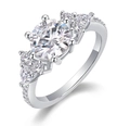 Moissanite 925 silver ring with a large round center stone and side accents - US 7 / Multi-Stone Cluster Round Style (R13144)