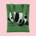 Green knitted tote bag featuring a cute giant panda pattern and black shoulder straps - Lying Panda Green