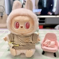 Cute Labubu plush doll wearing a beige knitted sweater with smiley patch and plush ears - Brown Smiley Face Pin Sweater / First And Second Generation Keychains Are Compatible With La Cloth Dolls. Dolls Not Included.
