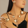 Golden flower jewelry set with necklace, earrings and rings featuring textured petals - Radial Textured Floral Style (5238) / Gold