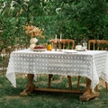 White tablecloth with 3D floral embroidery and tufted pom-poms for garden dining decor - White Pom-pom Hem