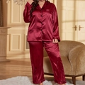 Two-piece satin pajama set in burgundy featuring long sleeves and contrast black piping - 1XL / Red