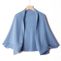 Blue knitted cashmere shawl cardigan with open front design on a wooden hanger - Haze Blue