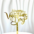 Macro shot of gold acrylic Happy Valentine's Day cake topper with hollow heart designs - Valentine's Day Gold 1 (approx. 10.5cm Wide)