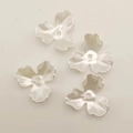 Macro detail of white pearl luster resin flower petals for DIY bridal jewelry making - Three-Petal White Base