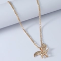 Vintage gouden adelaar hanger ketting met gespreide vleugels aan een stijlvolle cuban link - Goud