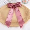 Elegant pink satin bow hair clip with flowing ribbon on a decorative vintage tray - Duckbill Hair Clips / Carmine