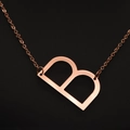 Elegant rose gold necklace with a minimalist letter B pendant on a fine metal chain - Rose Gold B