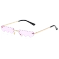 Stylish heart shaped purple sunglasses with slim gold metal frame shown from side angle - Gold Frame Purple Lens