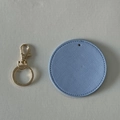 Light blue faux leather round keychain with gold lobster clasp and ring on grey background - Unassembled (DIY Set) / Sky Blue