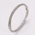 Silver finish stainless steel bangle featuring a double row conical stud rivet design - Steel