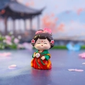 Cute doll figure in red and green Hanfu holding a fan on a reflective flower petal base - Gentle Breeze Large