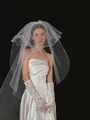 Detailed view of elegant white satin wedding dress with layered tulle veil and lace gloves - 3-Layer Face Covering Long Veil