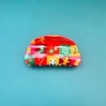 Kerst haarklem met kleurrijke peperkoekman- en sneeuwvlokprints op een cyaan achtergrond - Peperkoekman patchwork / 8.2cm