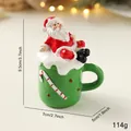 Christmas Santa figurine on cup resin ornament with size details 3.7x2.7 inches - Green Snowman Cup