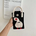 Detail of black knit mini bag with cartoon duck pattern and metal snap button closure - Black Tilting Head Duck