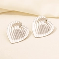 Detail of silver 304 stainless steel heart stud earrings with vertical ribbed texture - Vertical Ribbed Heart / Silver