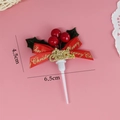 Christmas cake topper featuring holly leaves, red berries, and Merry Christmas bow - Three Berries Letter Bow Leaves