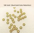 Detailed macro view of 18k gold plated snowflake spacers for DIY jewelry making and beading - 4mm Hole 1.2mm / 18K Gold Plated