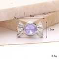 Detailed view of silver candy-shaped shoe charm with purple gem and size dimensions - Gem Candy Purple