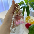 Cute Capybara liquid quicksand keychain with pink pig figurine and pearl beads strap - Chain Style-Apple
