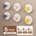 6-piece set of suction cup wall hooks in blue, pink, and yellow with foldable design - Set of 6 / Blue + Pink + Yellow