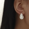 Elegant silver-colored pear-shaped water drop earrings with sparkling rhinestones on model - Silver Pear Halo Rhinestone Style (DTE1216340S)