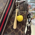 Mini wooden baseball bat keychain with yellow softball charm hanging on a stylish bag - 7.5CM Long Bat/Dark Yellow Ball