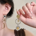 Bohemian vintage sun and moon asymmetric earrings with gold and silver metallic finish - Asymmetric Sun Moon Star (He27936)