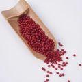 Deep red round simulation soybean grains and seeds on a natural bamboo spoon - Small Honey Dates (500g)