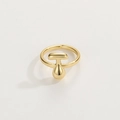 Detail of 18K gold-plated open ring with a polished T-shaped pendant on white background - Gold Ring T
