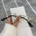 Lunettes de soleil carrées sans monture avec pont doré et branches en acétate noir - Monture Dorée Verres Transparents