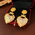 Pendientes de rosa dorada vintage con colgante de corazón irisado y detalle de lazo - Corazón Dorado Mate