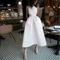 Elegantes weißes Midikleid mit Neckholder, tailliertem Schnitt und A-Linien-Rock - US size 2 (S) / Elfenbein