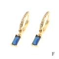 Close-up of 18K gold hoop earrings with pavé stones and rectangular blue zircon drops - Blue Square