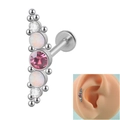 Detail of silver curved labret stud with white opal and pink zircon stones on model ear - Curved White+Snow Opal+Light Red