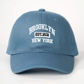 Detail of Brooklyn New York white and black embroidery on blue cotton baseball cap - One Size / Blue