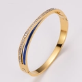 Golden stainless steel wrap bracelet with blue enamel inlay and sparkling zircon stones - Gold