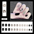 Black press-on nails with cow print, silver glitter, and large rhinestones in a 24pcs set - Mysterious Large Rhinestone (Z541)
