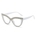 Occhiali da sole cat eye bianchi con densa decorazione in strass e dettagli scintillanti - Bianco