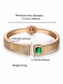 Luxurious gold-plated open bangle with green square gems and clear round zircons - Emerald