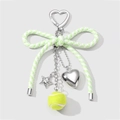 Exquisite handmade bow keychain featuring a silver heart and yellow tennis ball charm - Green Keychain 1PC