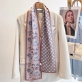 Pink silk scarf with floral and geometric patterns on a beige blazer stylish accessory - Argyle Peony