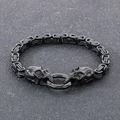 Schwarzes Byzantiner-Armband aus Edelstahl für Herren mit zwei Punk-Totenkopf-Anhängern - Schwarz / 19cm
