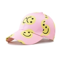 Detail view of pink twill baseball cap featuring yellow smiley face patterns and street style - Adjustable / Pink Smile Face