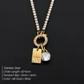 Elegante collana in acciaio inox placcato oro 14K con strass e ciondolo lettera W - Lettera W
