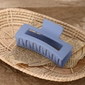 Matte hazy blue square hollow hair claw clip for women on vintage newspaper - 8.5cm Light Blue